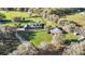 Expansive property featuring a charming home, lush green pastures, and a well-maintained barn at 10946 Gun Dog Way, Lithia, FL 33547