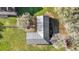 Overhead view of barn with metal roof and shaded areas at 10946 Gun Dog Way, Lithia, FL 33547
