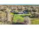 Aerial view showcasing the property's expansive land and well-maintained pastures at 10946 Gun Dog Way, Lithia, FL 33547