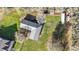 Aerial view showcases a barn, horse trailer, and fenced pastures, perfect for equestrian activities and country living at 10946 Gun Dog Way, Lithia, FL 33547