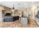 Comfortable and stylish living space with tile flooring, an open layout, and modern decor at 10946 Gun Dog Way, Lithia, FL 33547