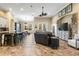 A large living space featuring an open floorplan, tile flooring, and seamless flow throughout at 10946 Gun Dog Way, Lithia, FL 33547
