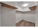 Walk-in closet featuring wood floors and wire shelving at 11555 Gulf Blvd Blvd # 115, Treasure Island, FL 33706
