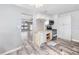 Renovation-ready kitchen space offers a great view, awaiting transformation into a culinary haven at 14050 W Parsley Dr, Madeira Beach, FL 33708
