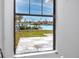 A waterfront view of the canal and neighboring houses at 14050 W Parsley Dr, Madeira Beach, FL 33708