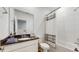 Bright bathroom with a granite countertop, white cabinets, and a shower-tub combination at 15033 Abby Birch Pl, Tampa, FL 33613