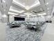 Elegant ballroom with high ceilings, chandeliers, and a stage, perfect for large gatherings and events at 15434 Santa Pola Dr, Wimauma, FL 33598