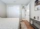 Bright bedroom featuring closet and doorway leading to other rooms at 15434 Santa Pola Dr, Wimauma, FL 33598