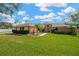 Charming single-story home featuring a well-kept lawn at 1731 Joe Mcintosh Rd, Plant City, FL 33565