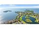 Beautiful aerial showcases waterfront community with stunning lake and bay views at 2077 N Pointe Alexis Dr, Tarpon Springs, FL 34689