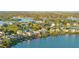 Serene neighborhood with gorgeous waterfront views, lush landscaping, and a tranquil atmosphere at 2077 N Pointe Alexis Dr, Tarpon Springs, FL 34689
