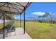 Community dog park with a shaded bench, providing a secure and enjoyable area for pets and their owners at 21181 Threadfin Way, Land O Lakes, FL 34638