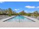 Sparkling community pool with plenty of lounge chairs, perfect for relaxation and enjoying sunny days at 21181 Threadfin Way, Land O Lakes, FL 34638