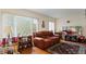 A comfortable living room with wide windows and cozy decor at 2370 Jamaican St # 30, Clearwater, FL 33763