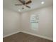 Bright bedroom features hardwood floors, a ceiling fan, and a window at 2650 22Nd S Ave, St Petersburg, FL 33712