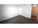 Bedroom featuring wood floors, a closet and neutral walls at 2651 Michael Pl # 102, Dunedin, FL 34698