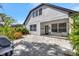 Large patio with ample space for seating, grilling, and entertaining, plus access to the home's interior at 3510 Brook Crossing Dr, Brandon, FL 33511