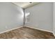 Bedroom with wood-look floors, ceiling fan and a window at 3510 Brook Crossing Dr, Brandon, FL 33511