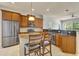 Kitchen features stainless steel appliances, granite countertops, seating at the raised bar at 3510 Brook Crossing Dr, Brandon, FL 33511