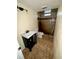 Bathroom features a vanity and tiled shower at 3521 Sumner Rd, Dover, FL 33527