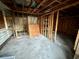 Unfinished garage with exposed framing at 3521 Sumner Rd, Dover, FL 33527