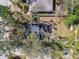 Aerial view of the home surrounded by lush trees at 3819 Queensboro S Ave, St Petersburg, FL 33711