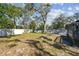 An expansive, fenced backyard with plenty of space to relax and enjoy nature at 3819 Queensboro S Ave, St Petersburg, FL 33711