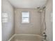 Bathroom features a shower over the bathtub at 3819 Queensboro S Ave, St Petersburg, FL 33711