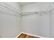 Walk-in closet includes wire shelving to keep you organized at 4049 Dolphin Dr, Tampa, FL 33617