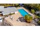 Aerial view of the community pool and surrounding seating at 4049 Dolphin Dr, Tampa, FL 33617