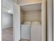 Convenient laundry area featuring a washer and dryer inside of a closet at 4049 Dolphin Dr, Tampa, FL 33617