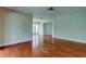 Inviting living room with hardwood floors and a bright, airy atmosphere at 4908 Lynchburg Ct, New Port Richey, FL 34655