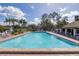 Large community pool featuring clear blue water and ample deck space for lounging at 4908 Lynchburg Ct, New Port Richey, FL 34655