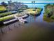 Scenic boat dock with boat, offering waterfront access and serene views of the water at 504 S Florida Ave # 225, Tarpon Springs, FL 34689