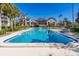Large community pool with building view; plenty of room for swimming and recreation at 504 S Florida Ave # 225, Tarpon Springs, FL 34689
