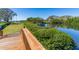 Lush water view from the bridge featuring a waterway, trees and surrounding landscaping at 504 S Florida Ave # 225, Tarpon Springs, FL 34689