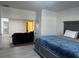 Spacious bedroom suite offering a comfortable living area, and a peaceful retreat at 5144 Pine Tree Ln, Wesley Chapel, FL 33543