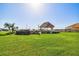 Beautifully maintained picnic area by the water offering a delightful spot for outdoor dining and enjoyment at 620 Edgewater Dr # 204, Dunedin, FL 34698