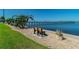 Peaceful waterfront area with benches and lush greenery, providing a serene retreat for relaxation and contemplation at 620 Edgewater Dr # 204, Dunedin, FL 34698