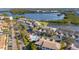 Aerial view of neighborhood and community pool next to a pond at 6311 99Th N Way # 11B, St Petersburg, FL 33708