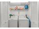Functional laundry room equipped with a washer and dryer at 6311 99Th N Way # 11B, St Petersburg, FL 33708