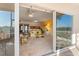 Spacious living room offering panoramic views and seamless indoor-outdoor living at 6311 99Th N Way # 11B, St Petersburg, FL 33708