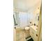 Bright bathroom with a shower, tub, and a vanity at 6818 123Rd Ave, Largo, FL 33773