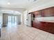 Bright kitchen featuring stainless steel appliances, ample cabinet space, and tile flooring at 7541 Mariners Harbour Dr, Wesley Chapel, FL 33545