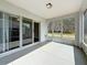View of screened patio with sliding glass doors at 7541 Mariners Harbour Dr, Wesley Chapel, FL 33545