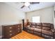 Bedroom featuring tile floors, leather couch and matching dresser at 822 W Kirby St, Tampa, FL 33604