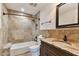 Bathroom features a large tiled shower and bathtub combination and a wooden sink vanity at 921 39Th Ne Ave, St Petersburg, FL 33703