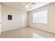 Bedroom features tile flooring, standard closet door, and a large window at 13304 Sanctuary Cove Dr # 303, Temple Terrace, FL 33637