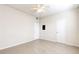 Bedroom features tile flooring, ceiling fan, and standard closet doors at 13304 Sanctuary Cove Dr # 303, Temple Terrace, FL 33637