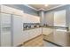 Bright kitchen area features ample cabinet space, modern appliances, and plenty of counter space at 13304 Sanctuary Cove Dr # 303, Temple Terrace, FL 33637